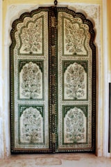 Laser-cut designer door showcasing delicate floral patterns.