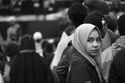 Historic black-and-white photo capturing Khaleda Zia during her early political days.