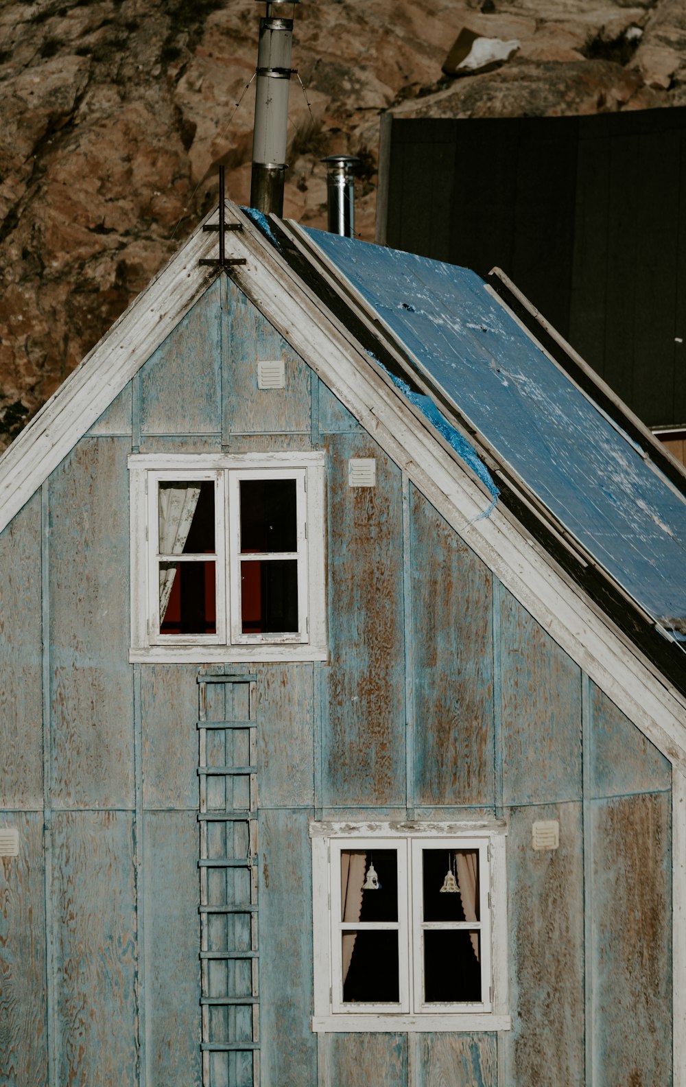 brown and blue wooden house