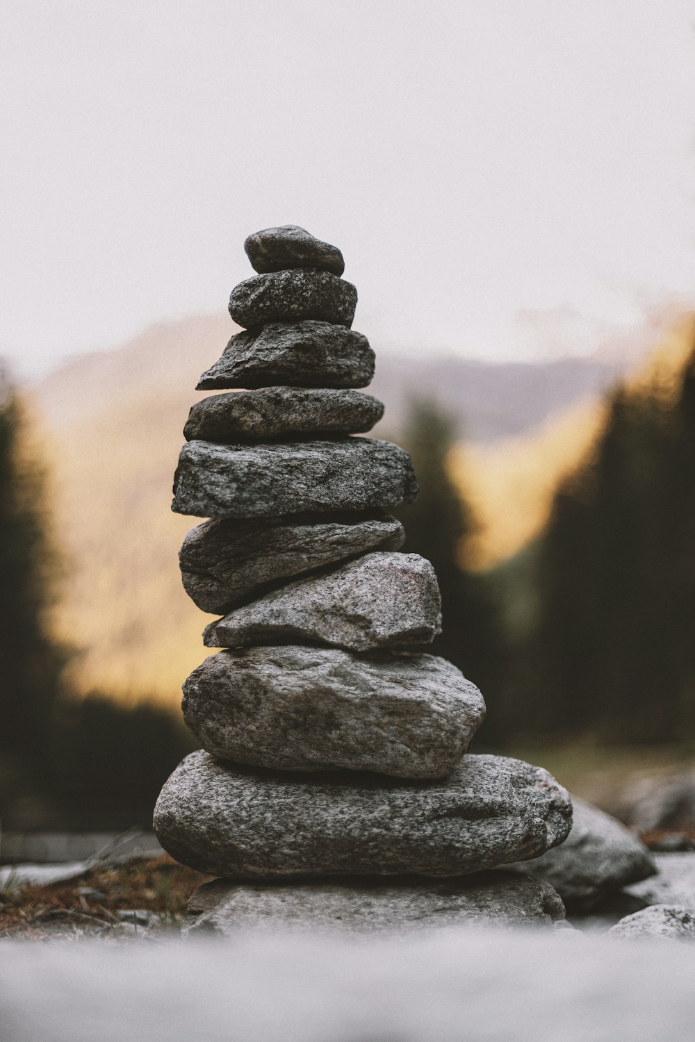 selective focus photography of pile of stones