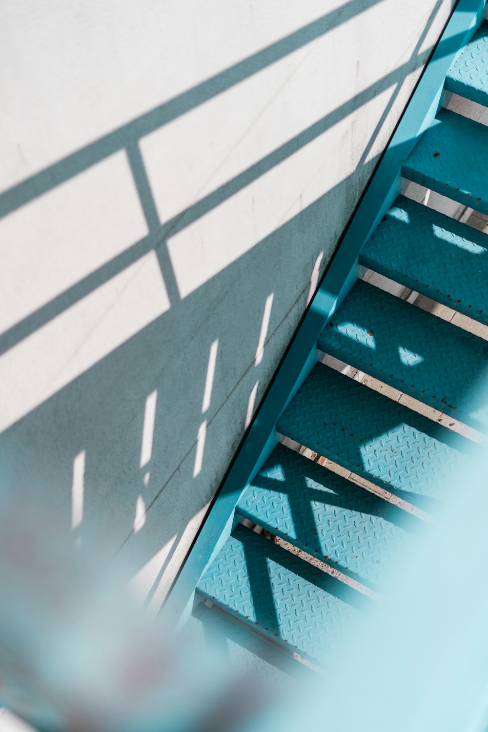 a man riding a skateboard down a set of stairs