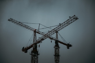 yellow steel tower crane