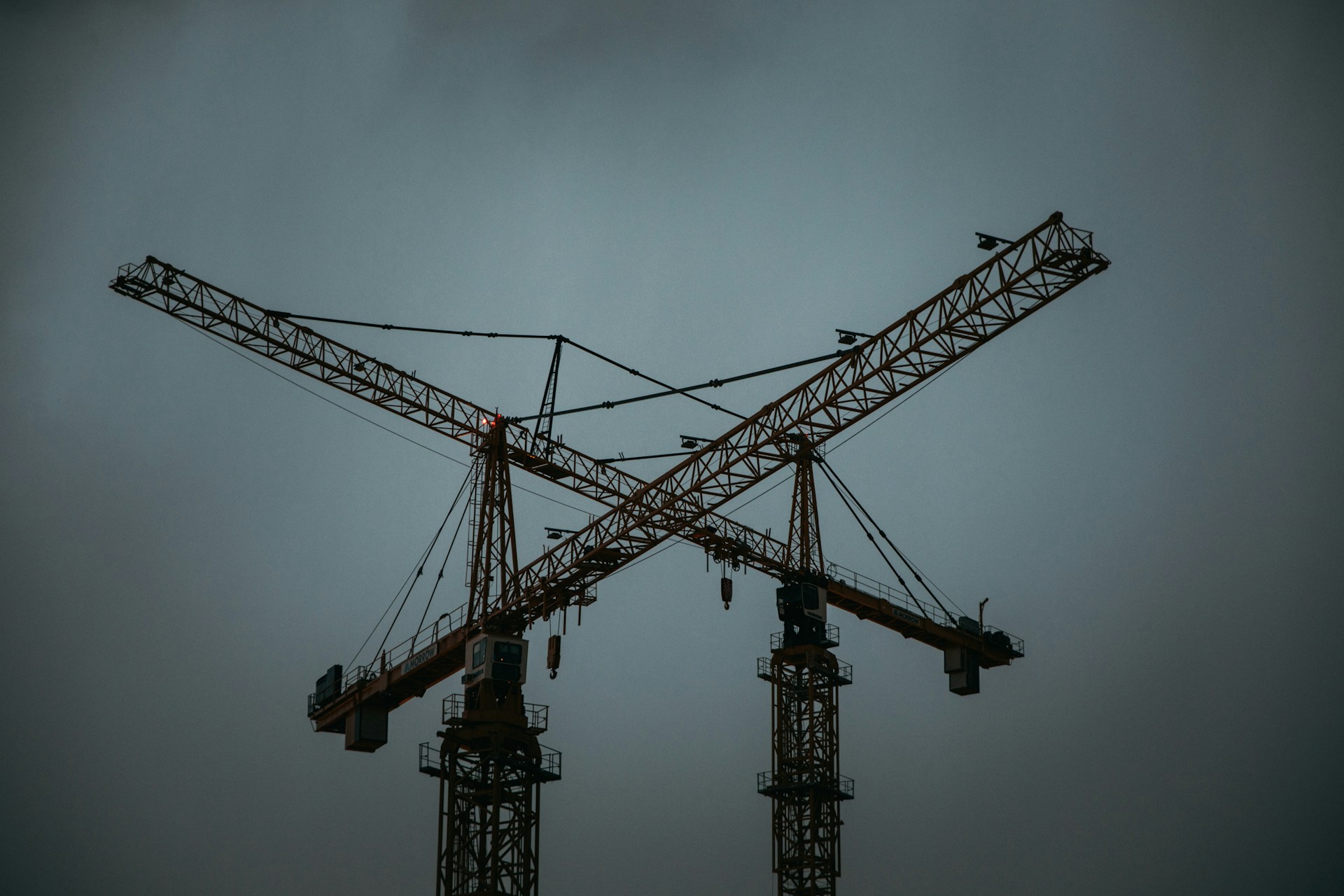yellow steel tower crane