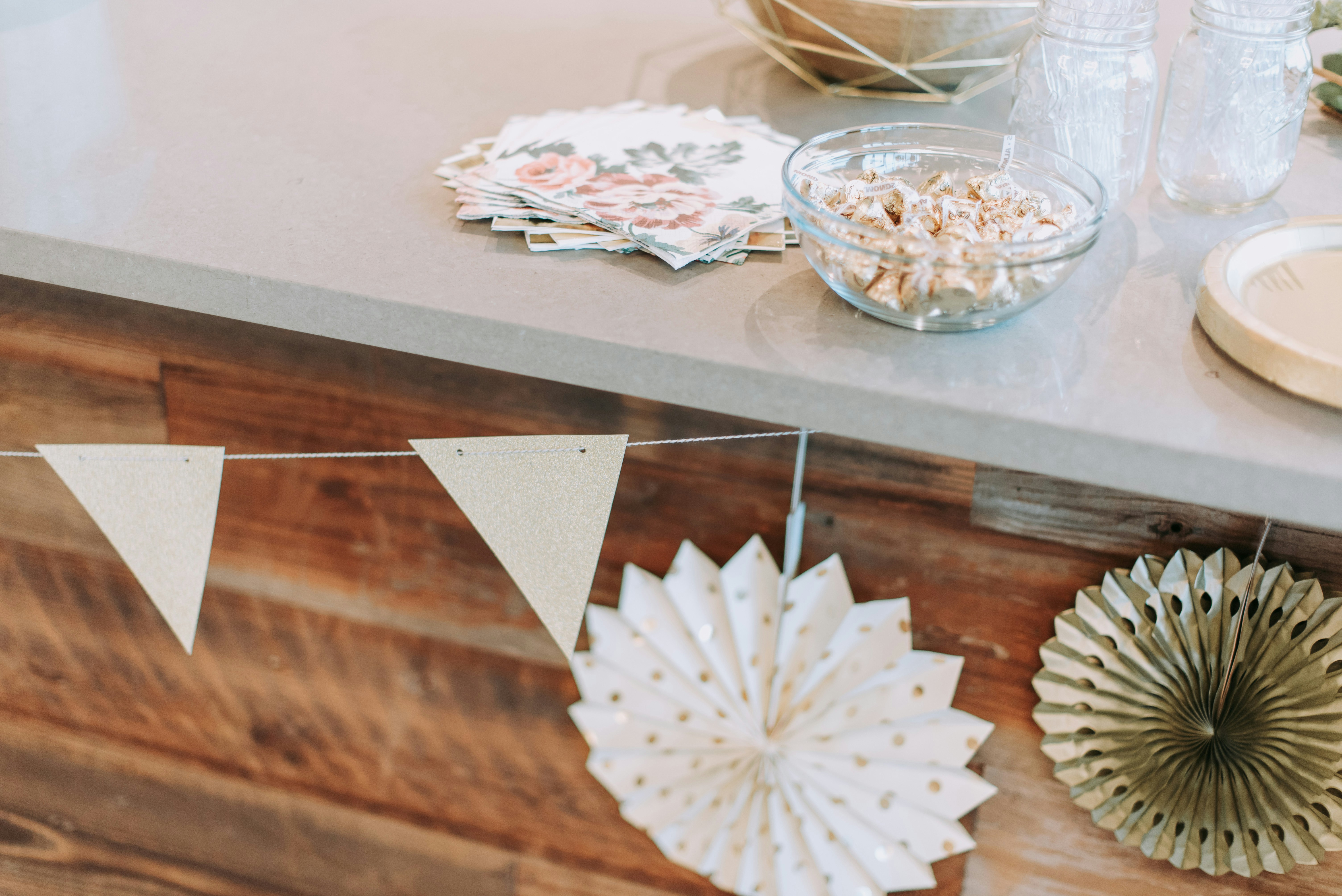 Party supplies, napkins, and tableware neatly arranged on a table