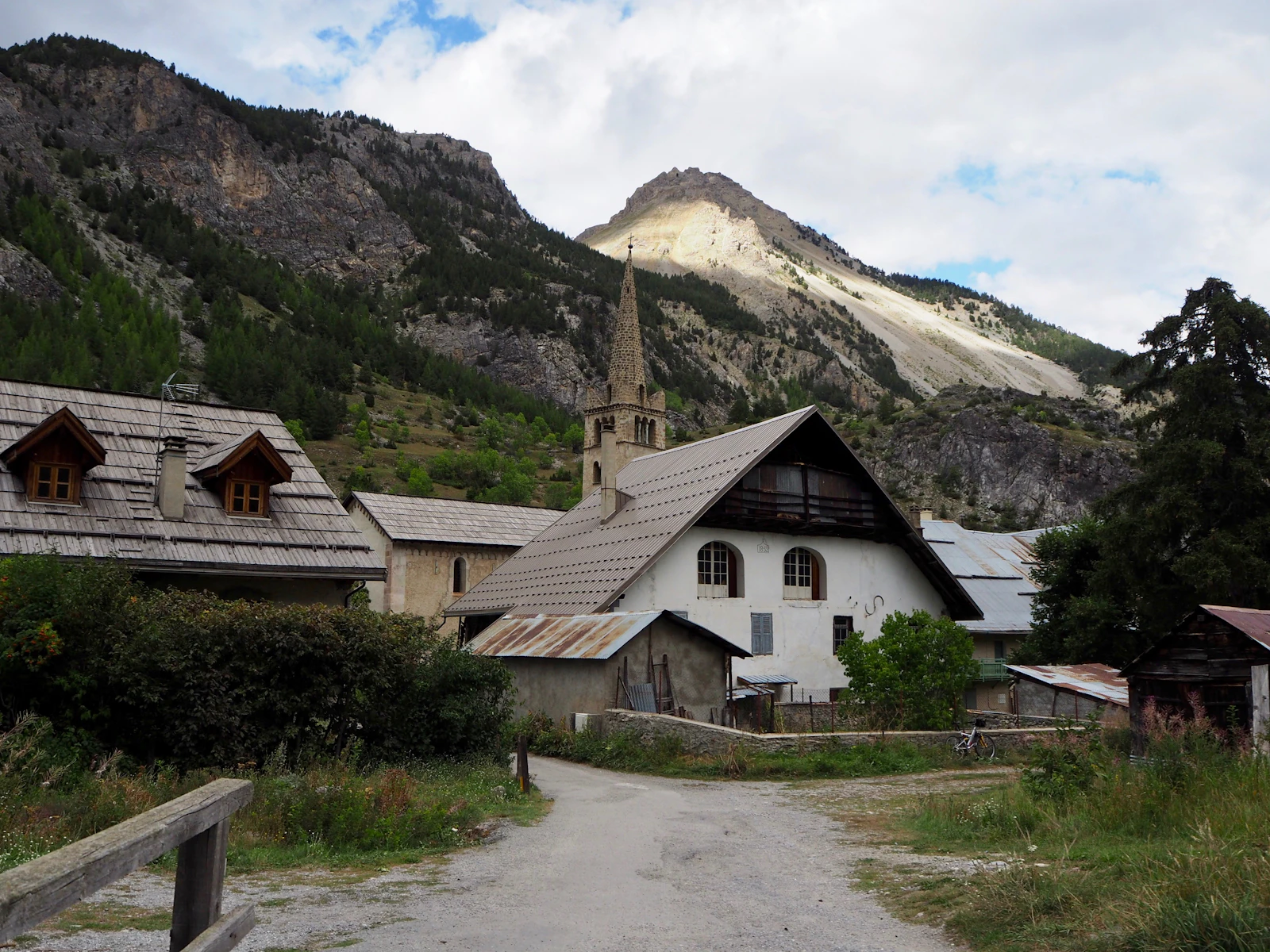 An Alpine village of wooden chalets under the Paznaun ridges