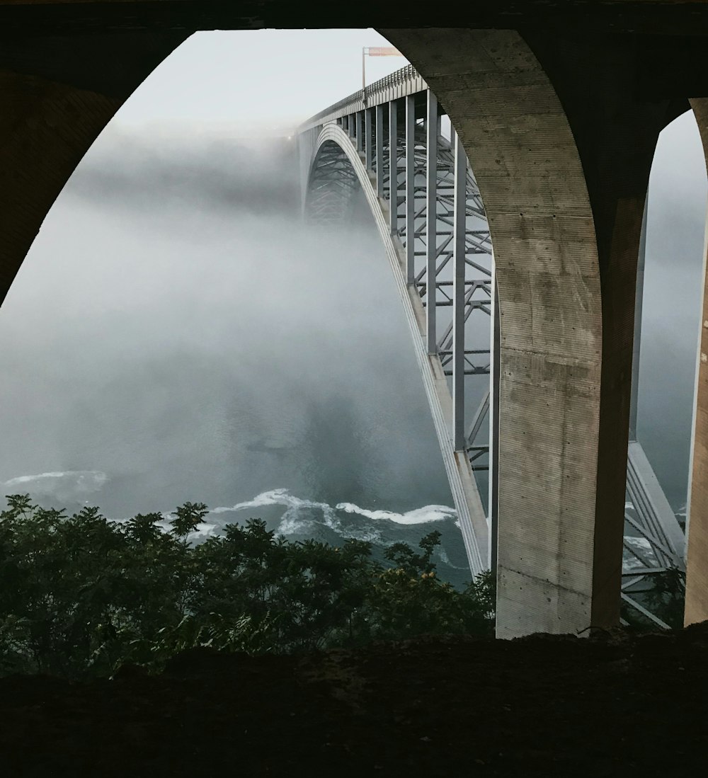 gray concrete arch bridge