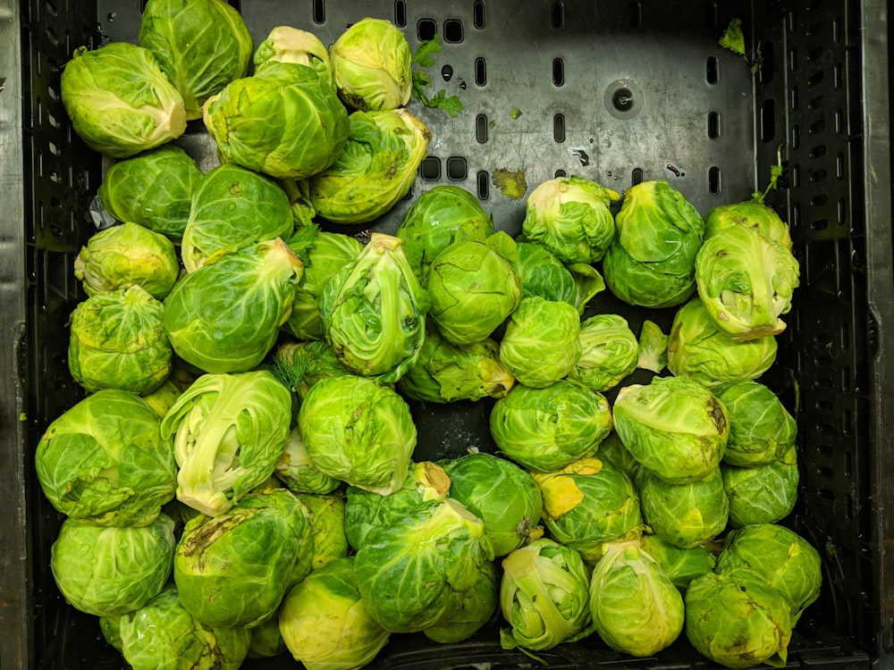 green vegetables in black basket