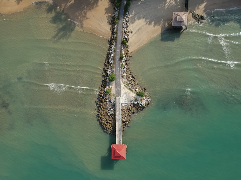 aerial photography of house over body of water during daytime