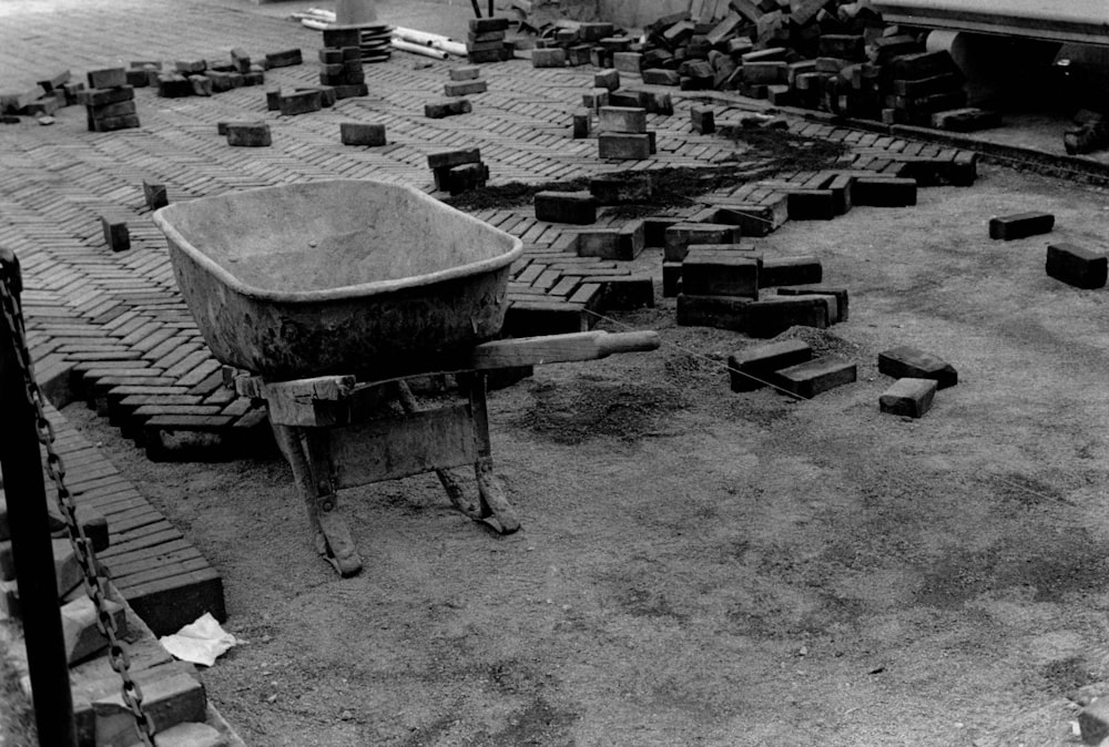 grayscale photo of wheelbarrow