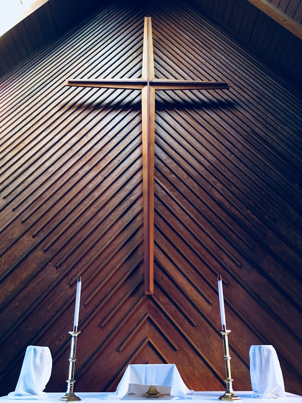 brown cross on altar