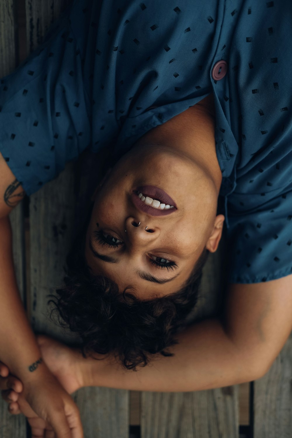 woman lying on dock