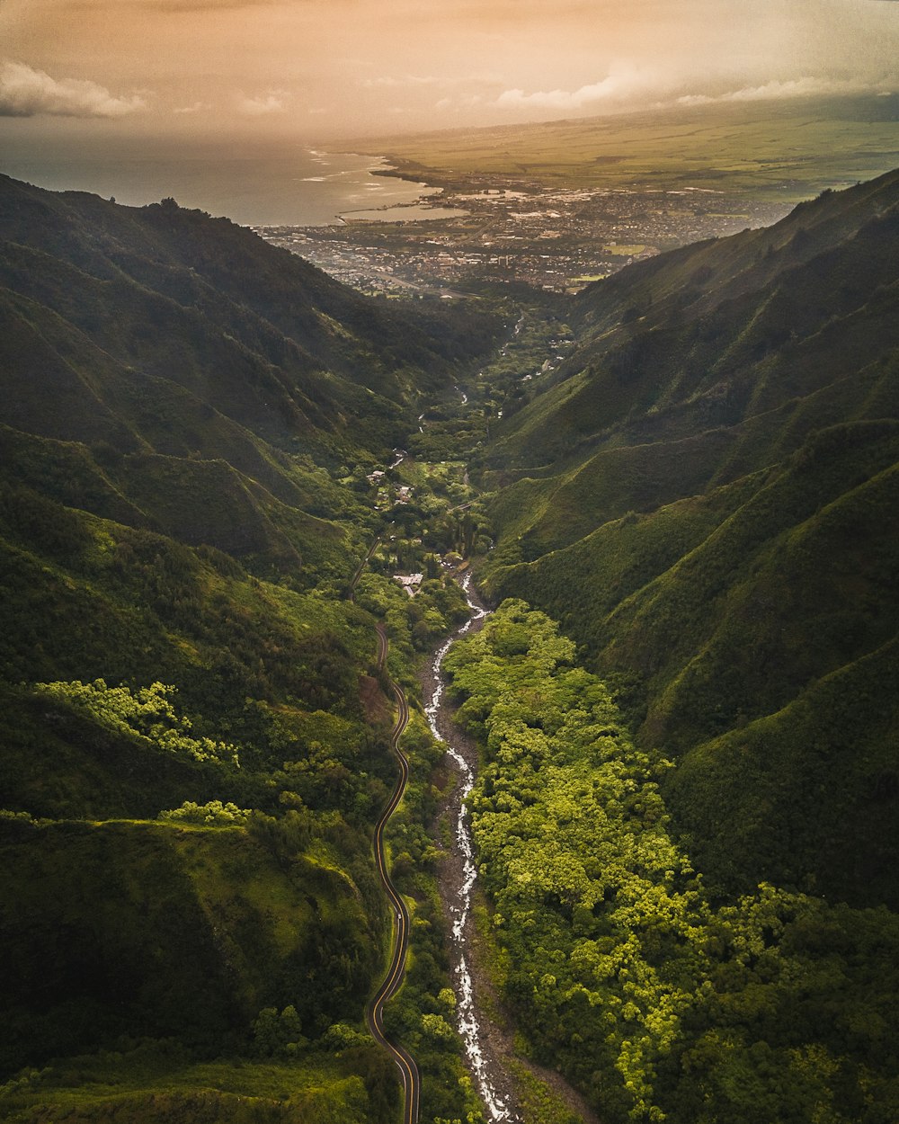 aerial photography of river between mountain