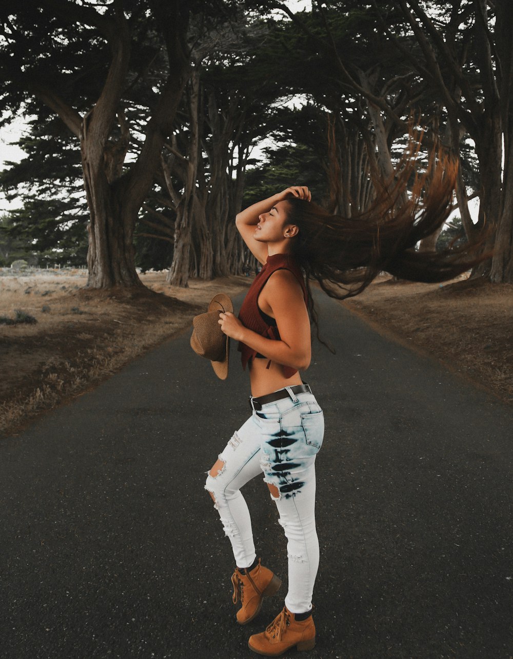 woman posing in the middle of street