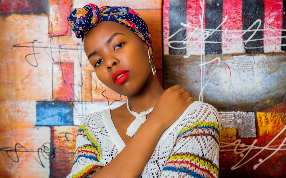 woman leaning on wall