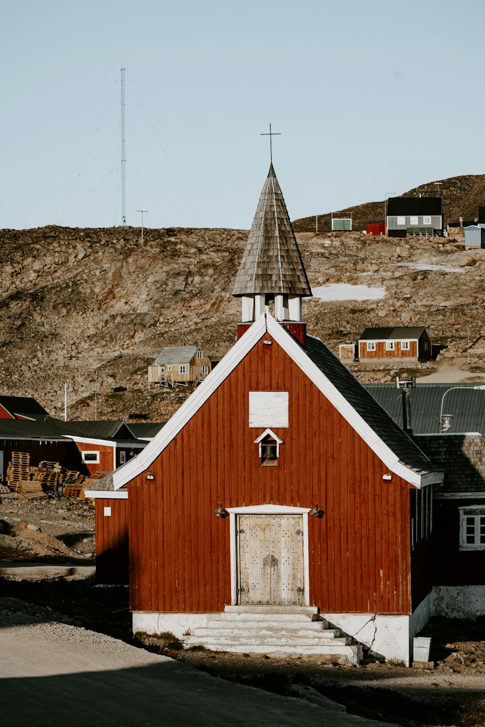 brown church near houses