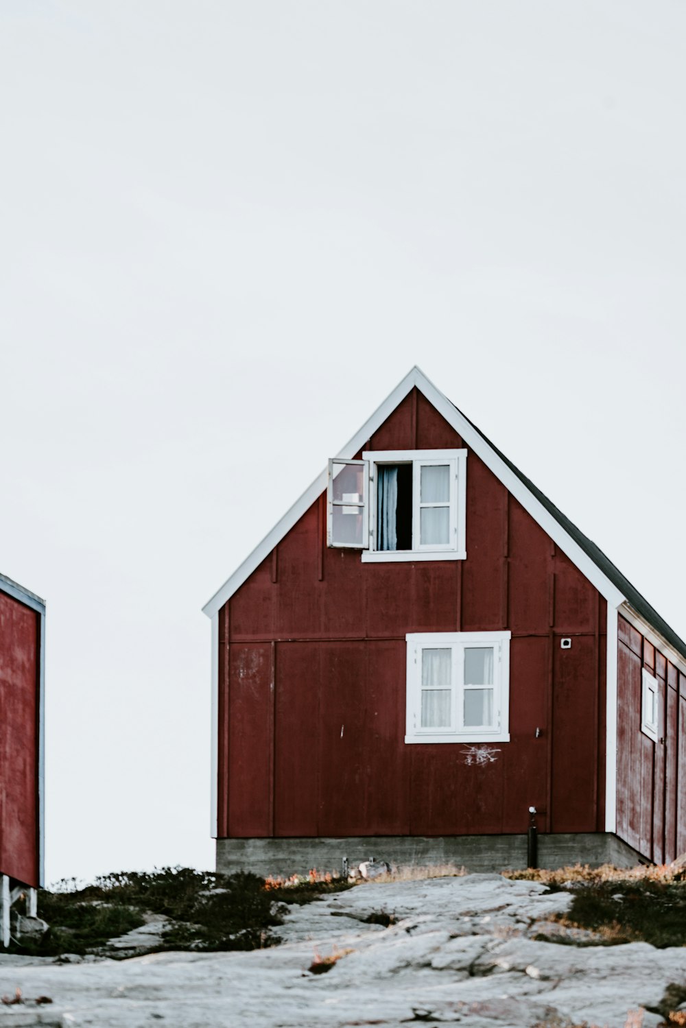 brown wooden house under white sky