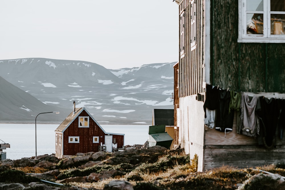 house in front body of water