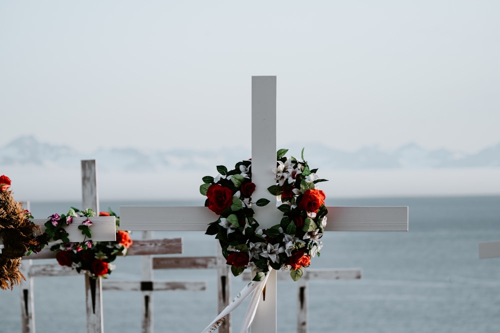 white cross with wreath