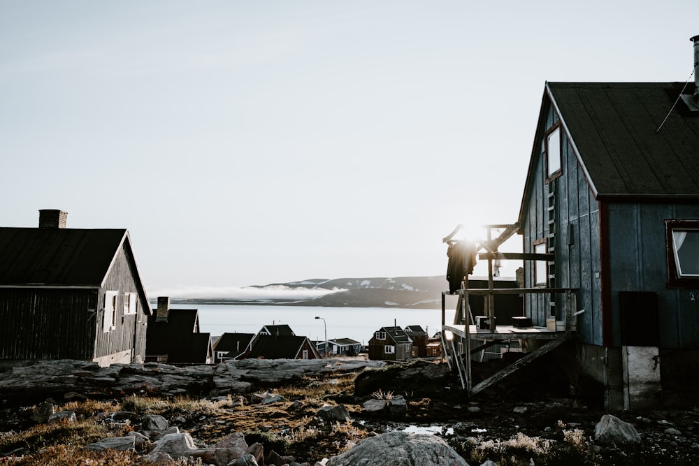 photography of houses near body of water