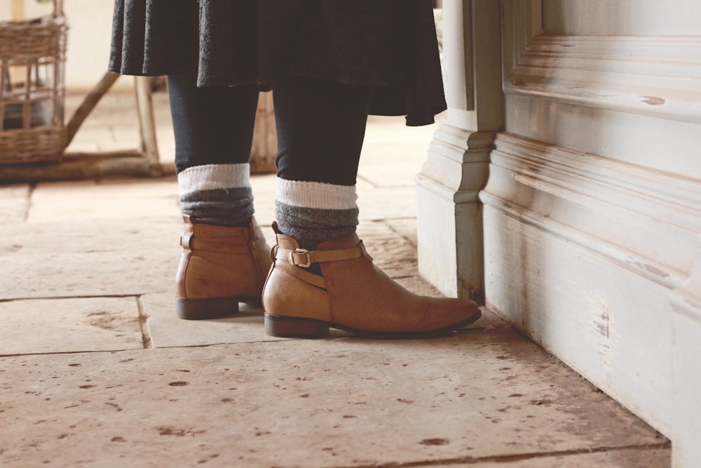 pair of brown leather heeled harness booties