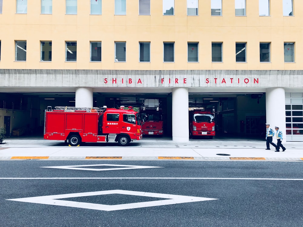 three red firetrucks