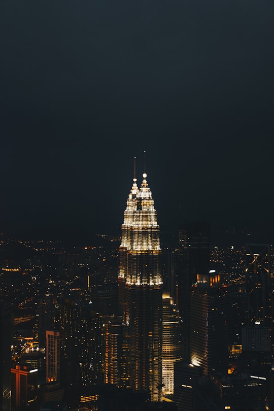 photo of tower during nighttime in Menara Kuala Lumpur Malaysia