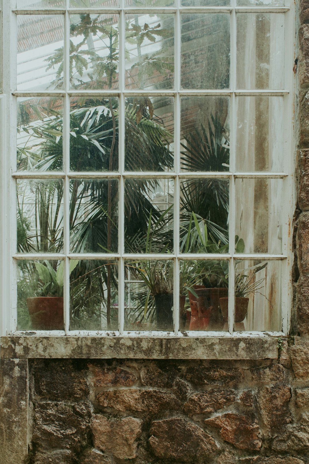 white framed clear glass window