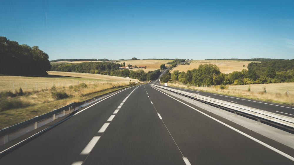 empty asphalt road during daytime