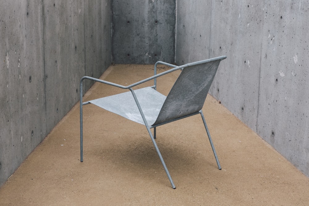 gray metal armchair inside room