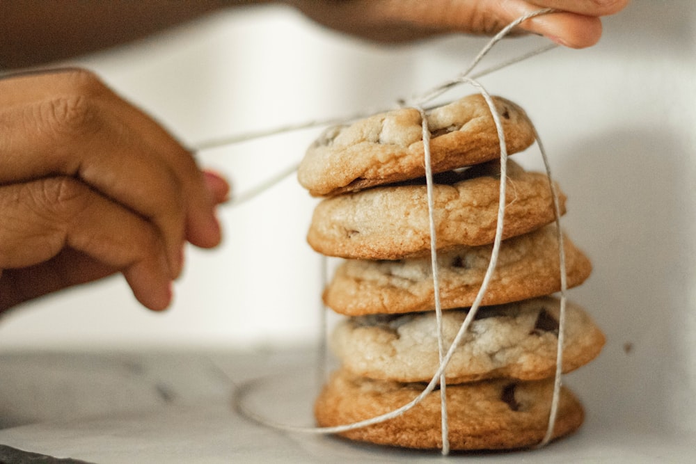 person holding cookies