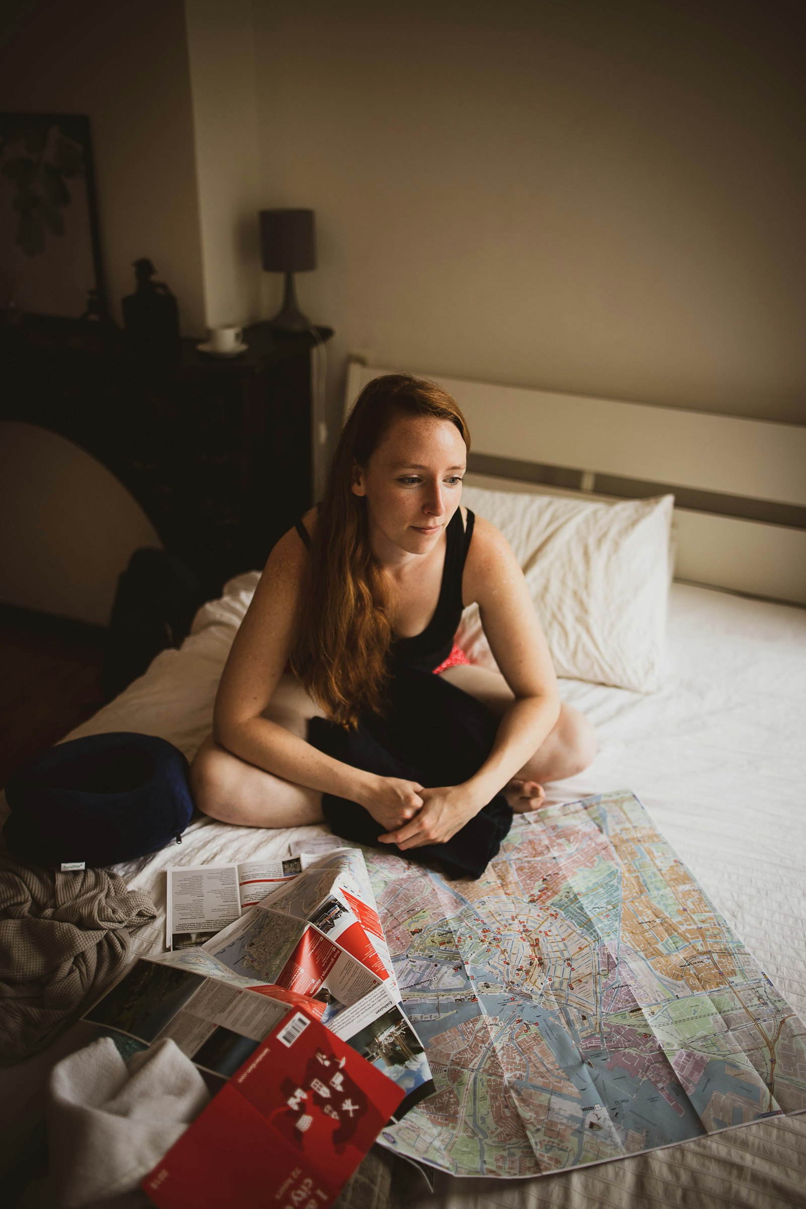 Sigma 24mm F1.4 DG HSM Art sample photo. Woman sitting on bed photography