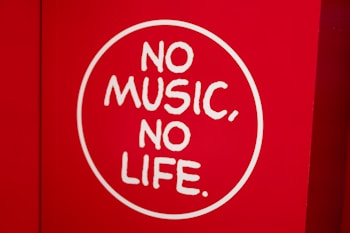 A red background features a white circle with the phrase 'NO MUSIC, NO LIFE' written in bold, white letters.