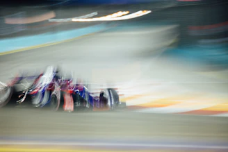 a blurry photo of a motorcycle on a track