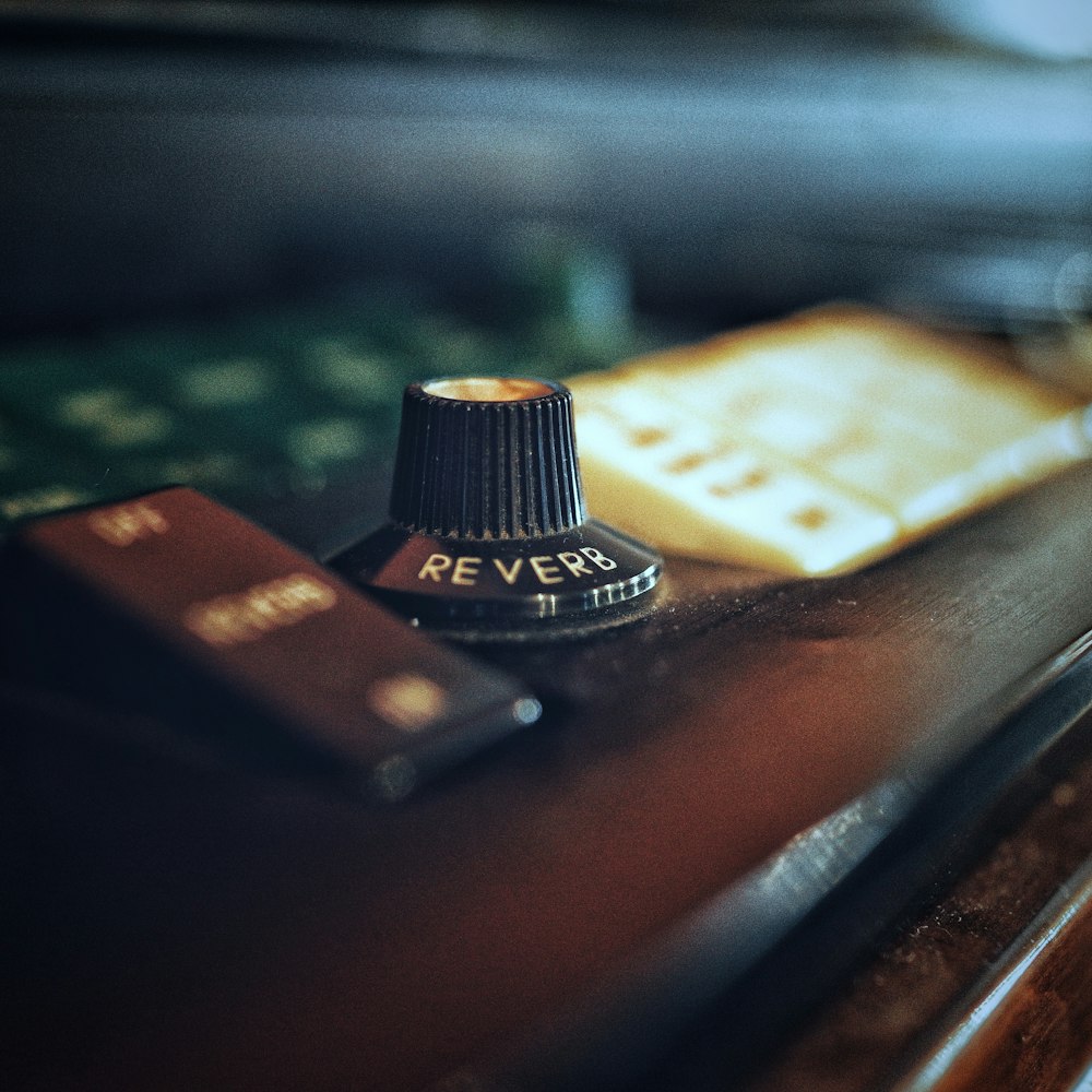 selective focus photography of reverb knob