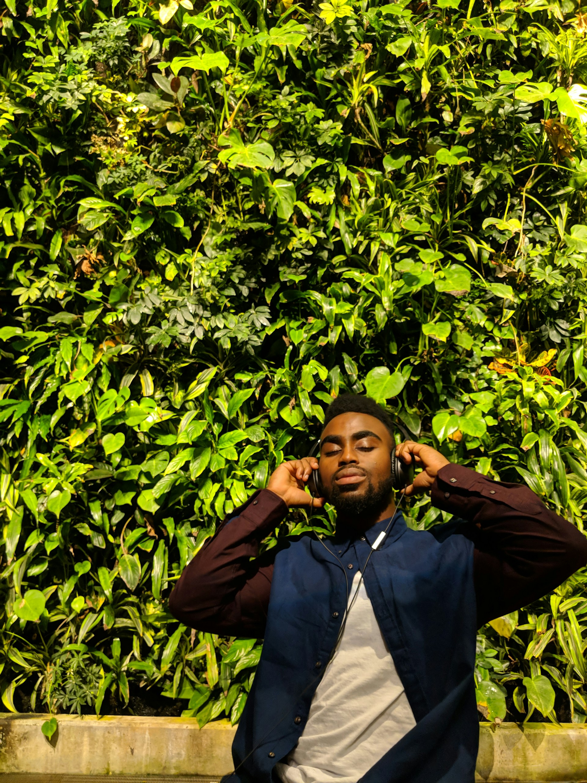 woman wearing yellow long-sleeved dress under white clouds and blue sky during daytime