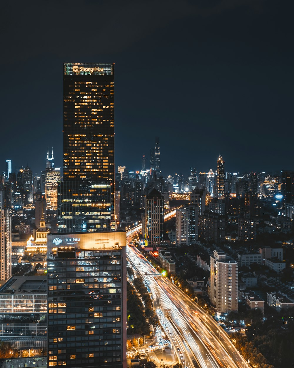 time lapse photography of high rise building