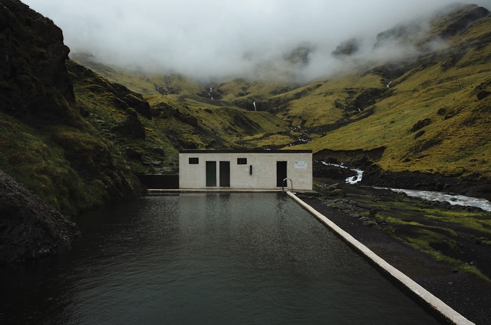 white cabin on mountain