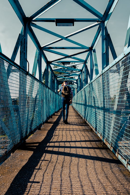 person standing on bridge in Lincoln United Kingdom