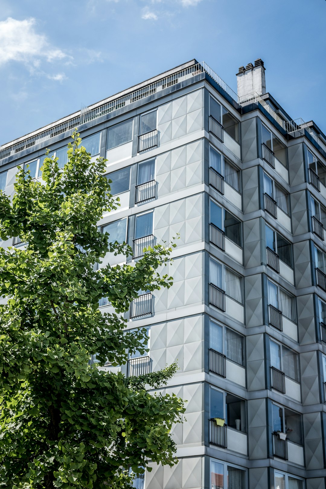 low angle photo of white high-rise building