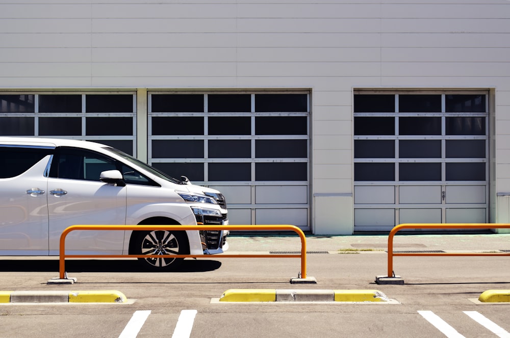 white minivan parked on road