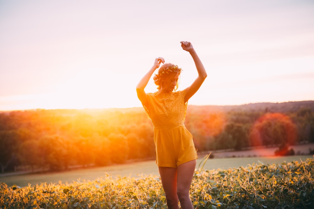 woman wearing yellow rompers