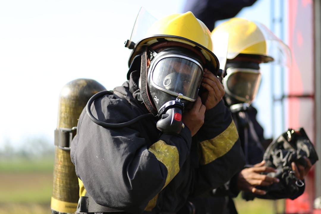 fireman putting his gas mask