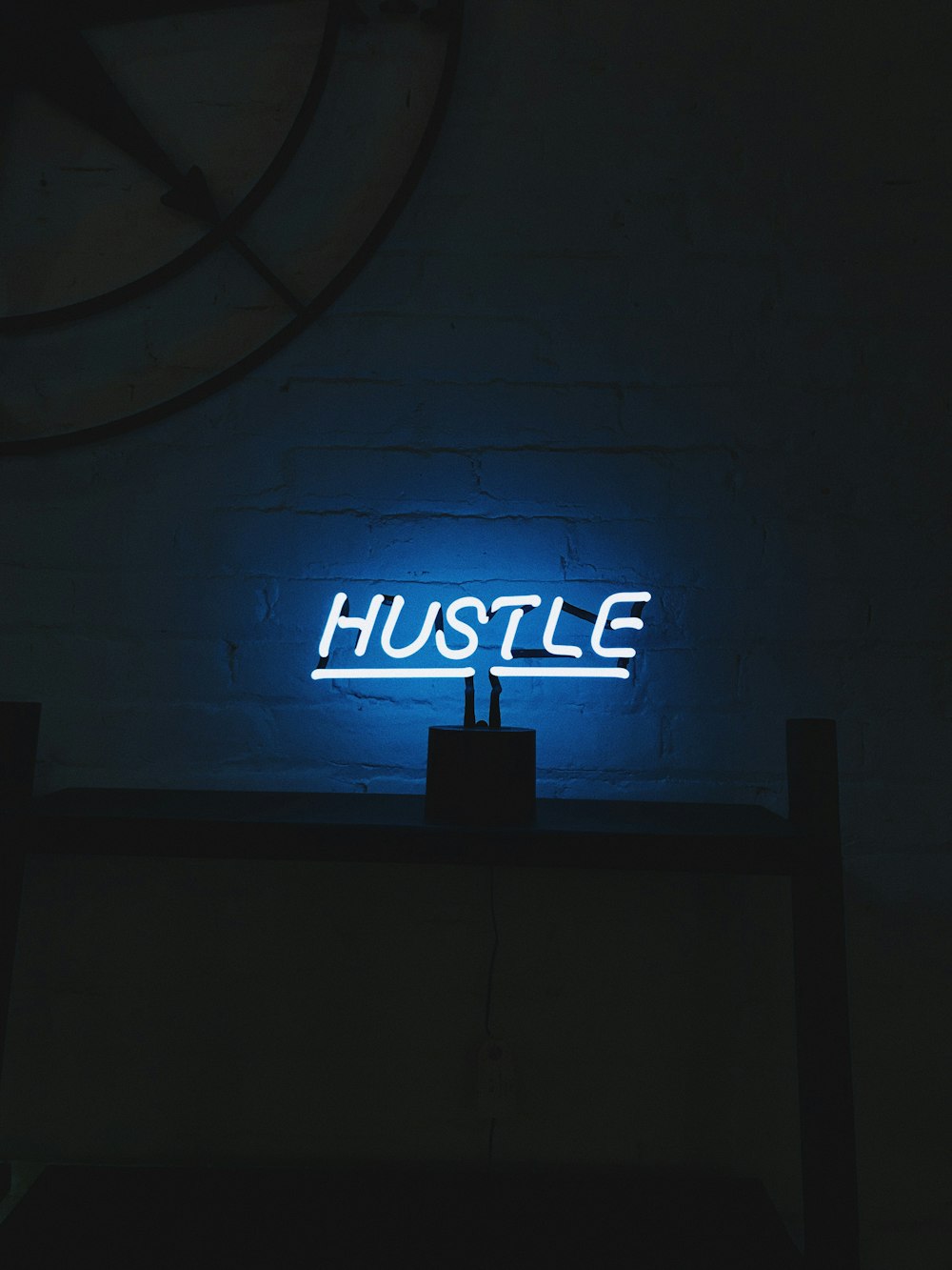 hustle LED signage turned on