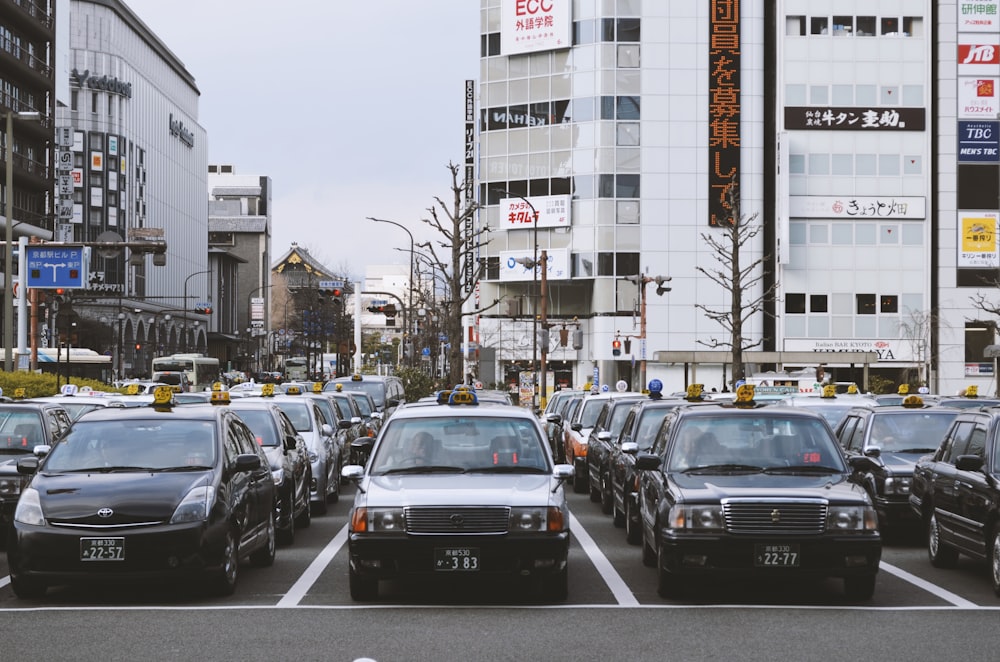 assorted-color vehicle parked on road