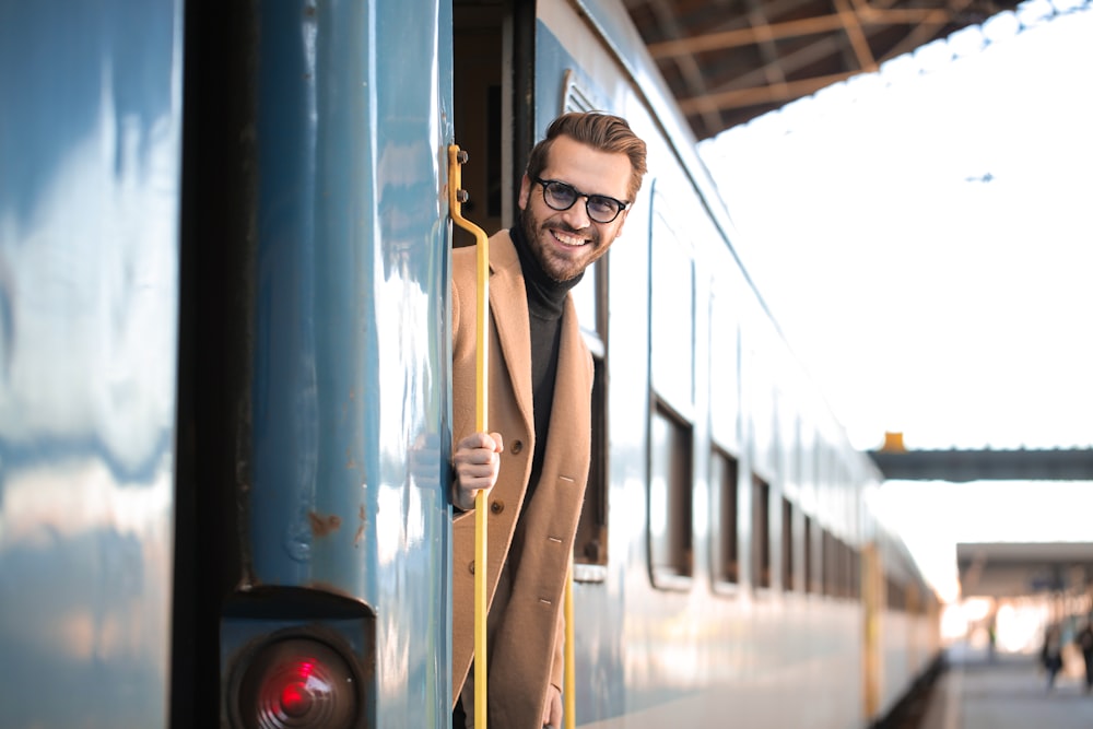 man riding train