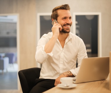 man using smartphone on chair