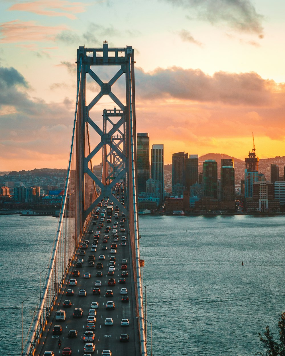 vehicles traveling on bridge during daytime