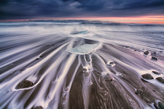time lapse photography of body of water in Jökulsárlón Iceland