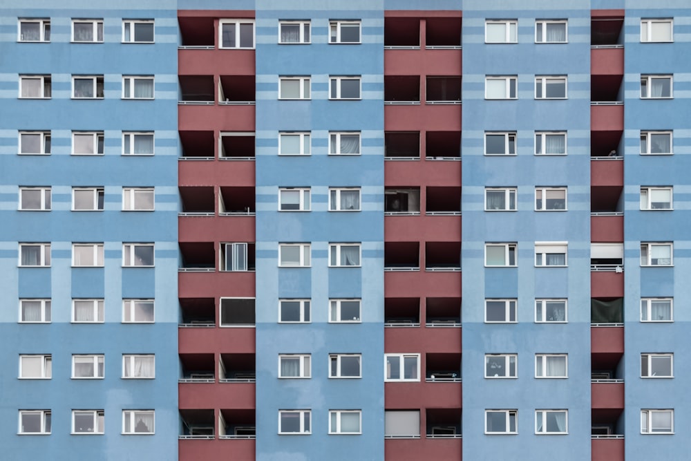 architectural photography of blue and brown concrete building