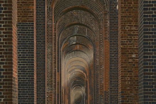 brown and black concrete hallway in Ouse Valley Viaduct United Kingdom